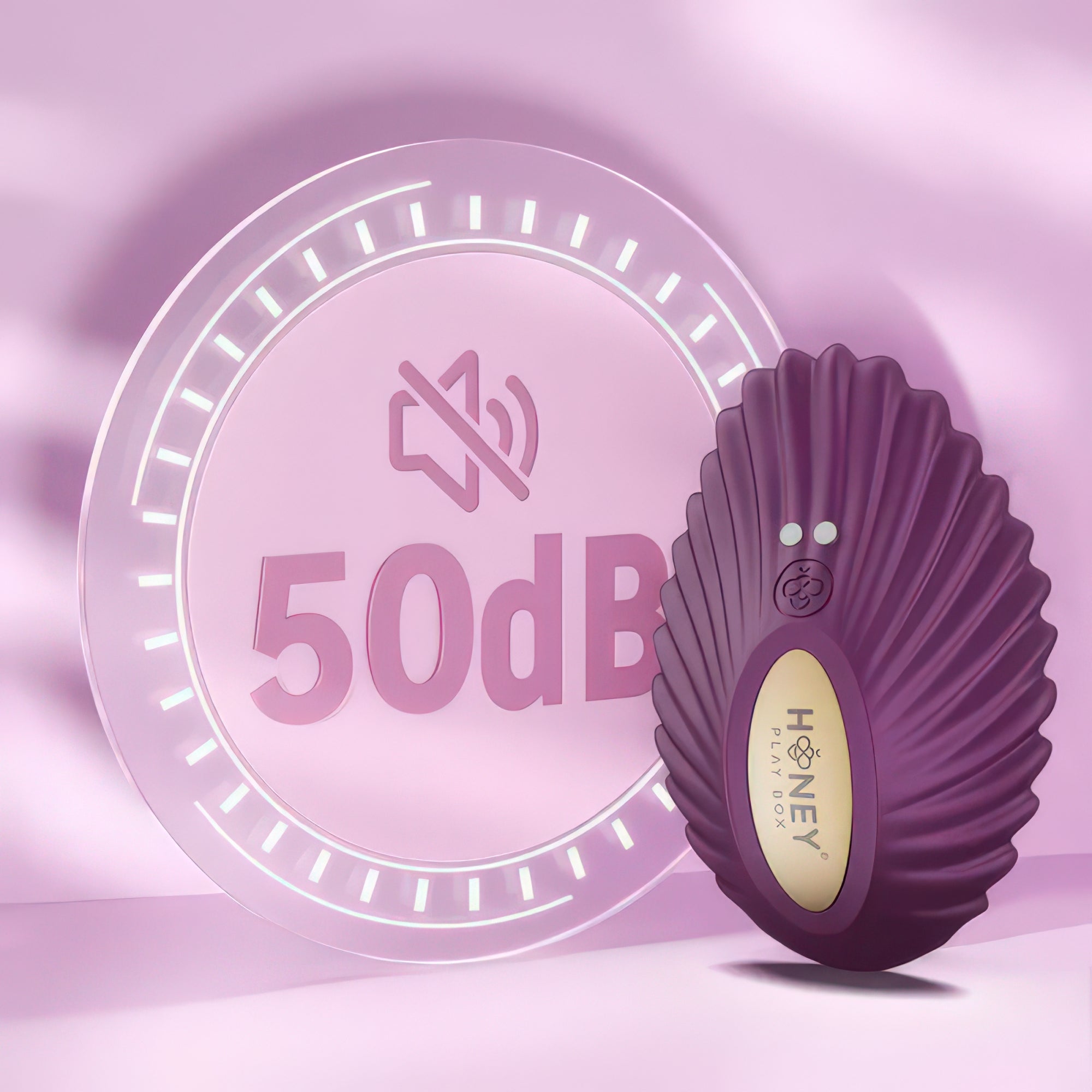 Purple device with 'Honey Play Box' branding on a pink background with a 50dB indicator.