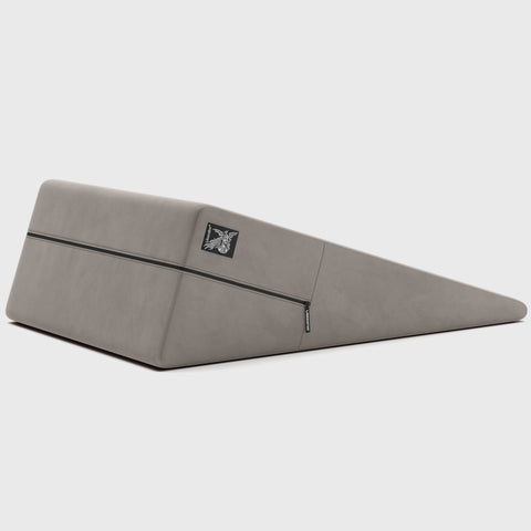 Gray ramp pillow with a brand logo on a white background