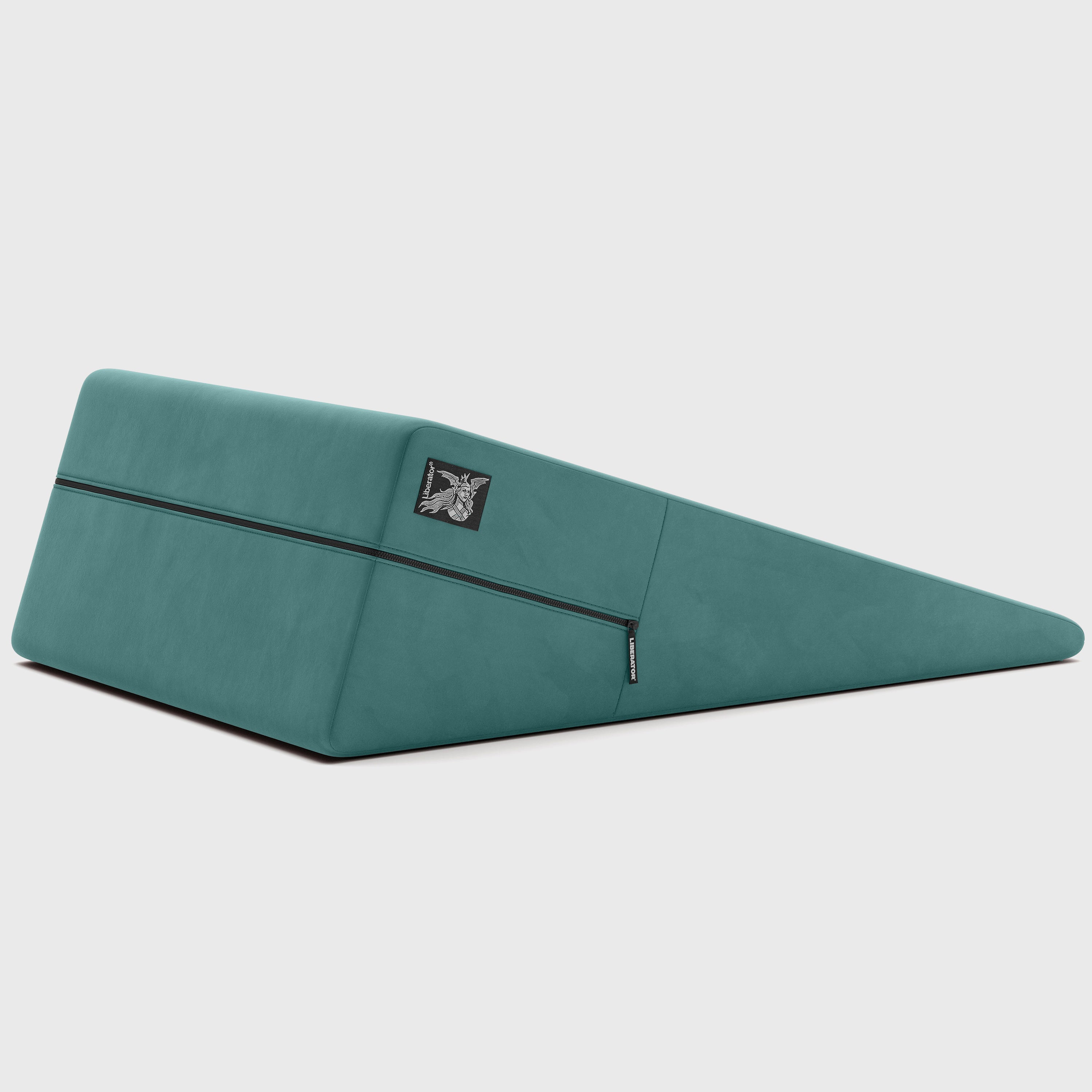 Teal ramp pillow with a brand logo on a light gray background