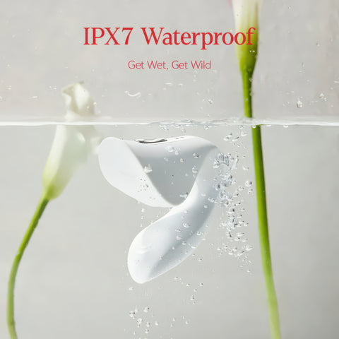 White electronic device with water droplets, surrounded by flowers, on a light gray background with 'IPX7 Waterproof' text.