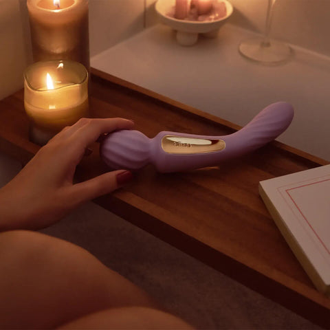 Switch wand next to candles and bathtub