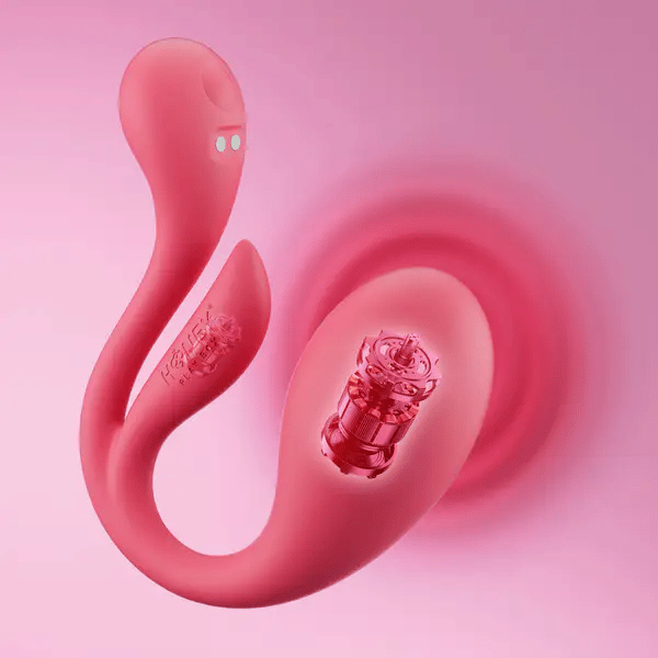 Pink silicone product with internal motors on a pink background