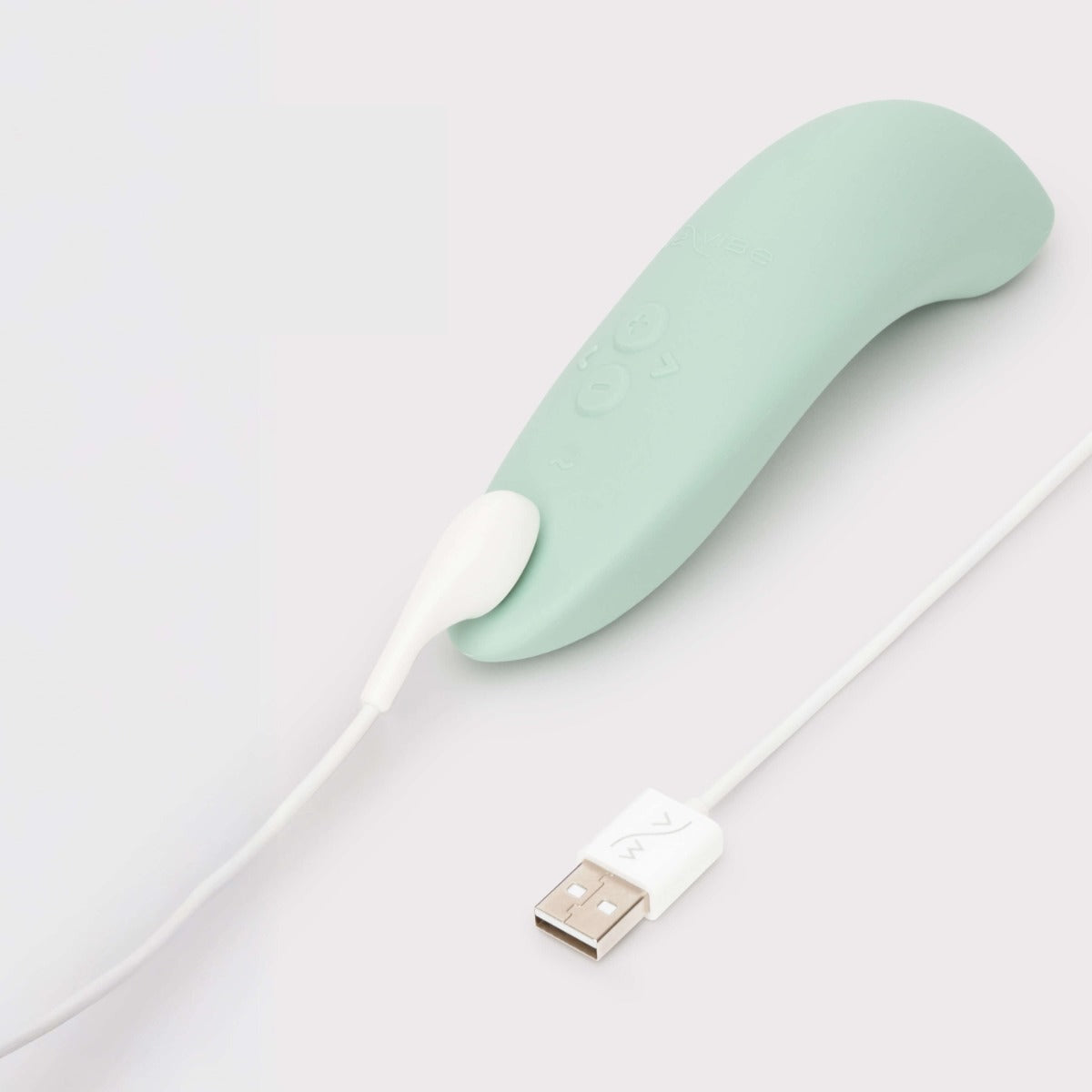 on white photo of magnetic charging cable for the We-Vibe Melt 2 clitoral air vibrator in sage green