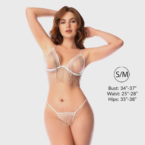 Woman wearing a sheer fringe lingerie set on a white background