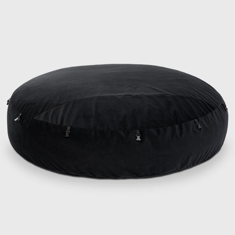 Black round cushion on a white background