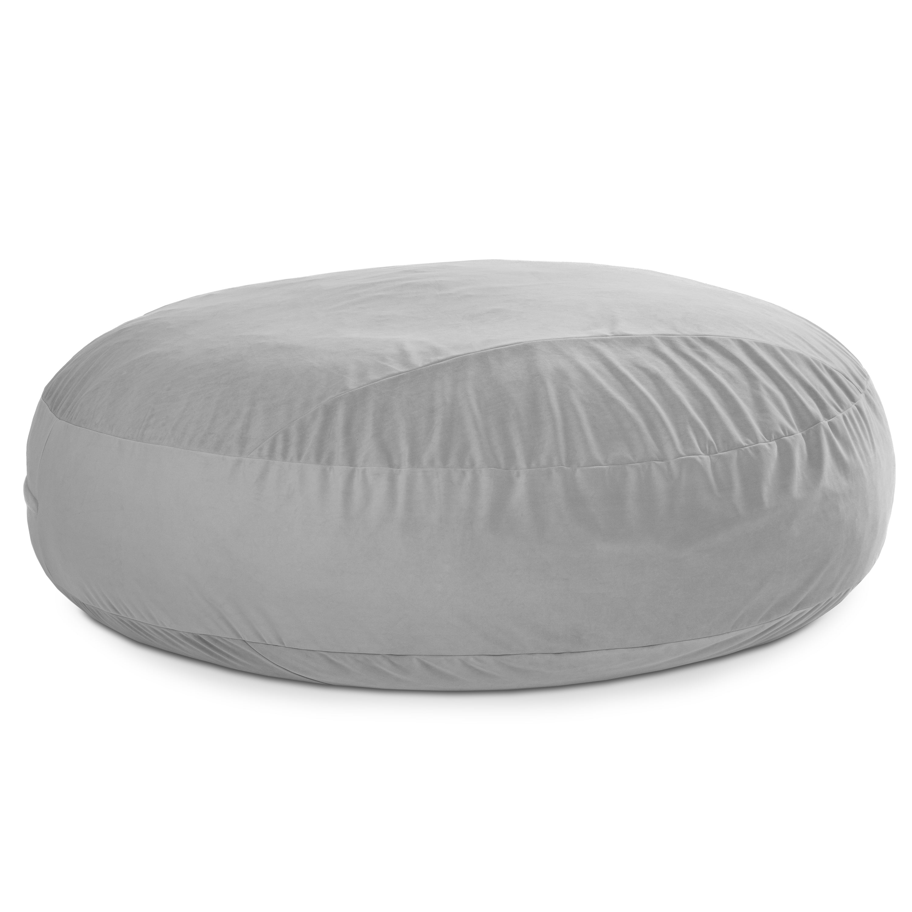 Gray round ottoman on a white background