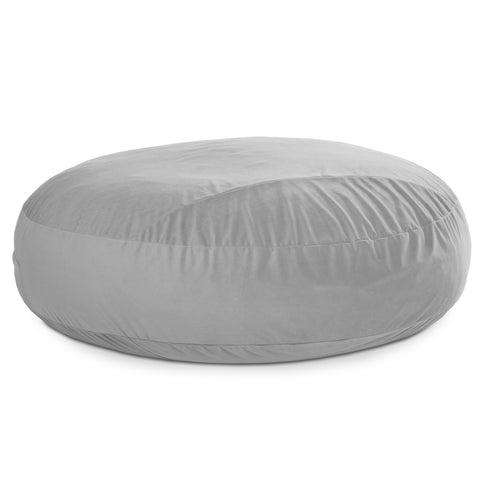 Gray round ottoman on a white background