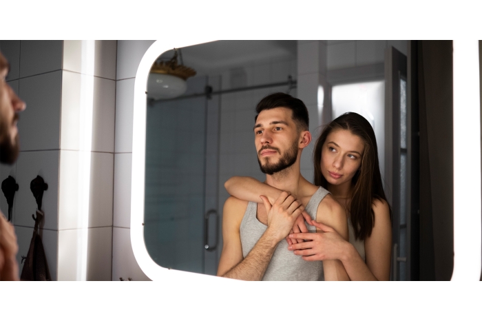 Couple posing in the mirror