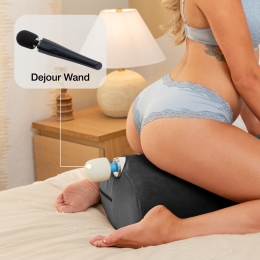 Woman sitting on Wing showing Liberator Dejour Wand