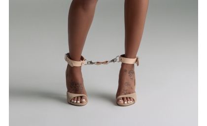 Forza Leather ankle cuffs in tan on model