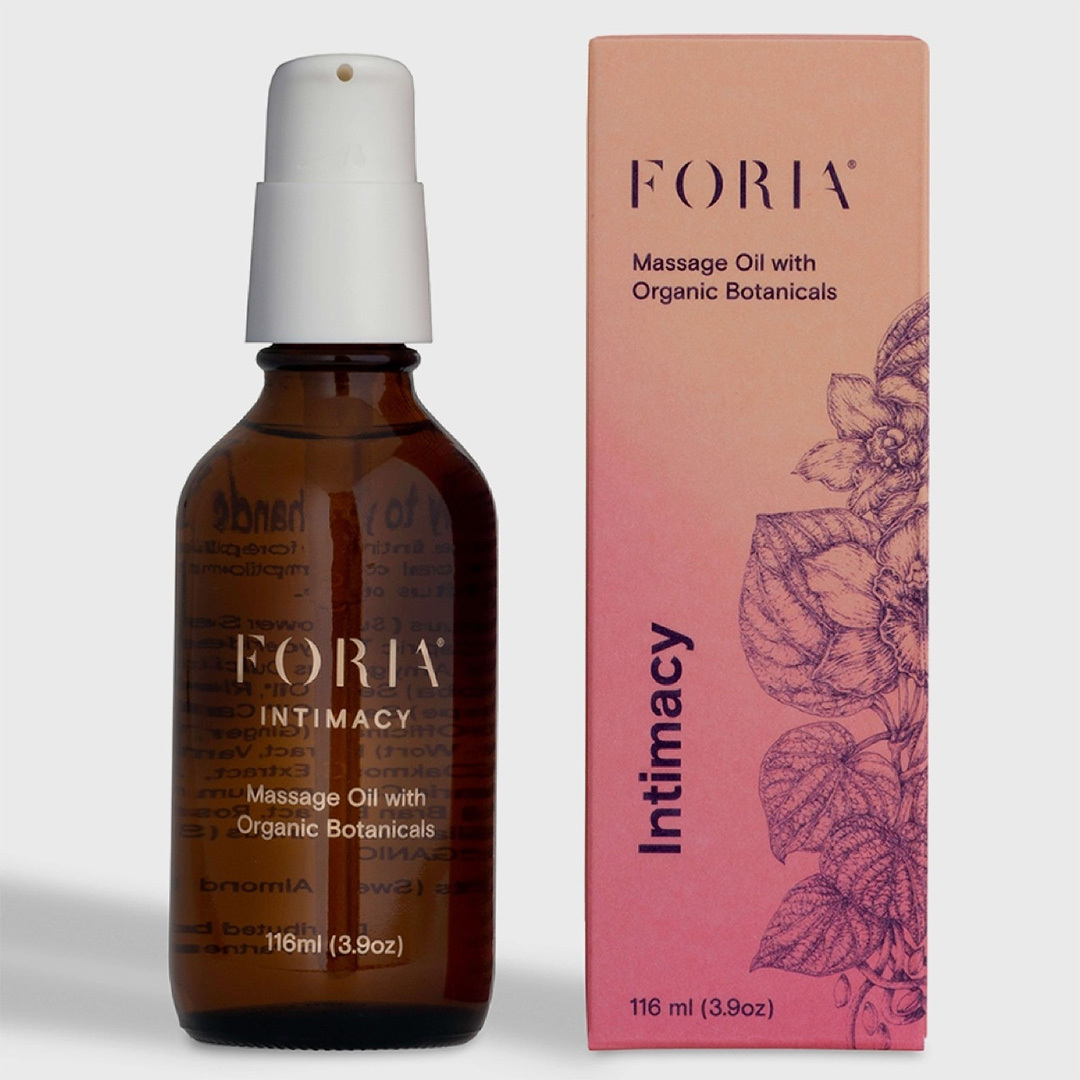 On white Foria intimacy arousal massage oil